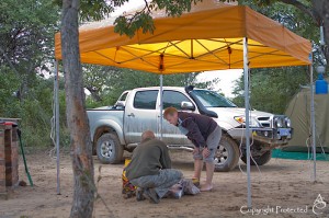 Building a camp-fire under the gazebo